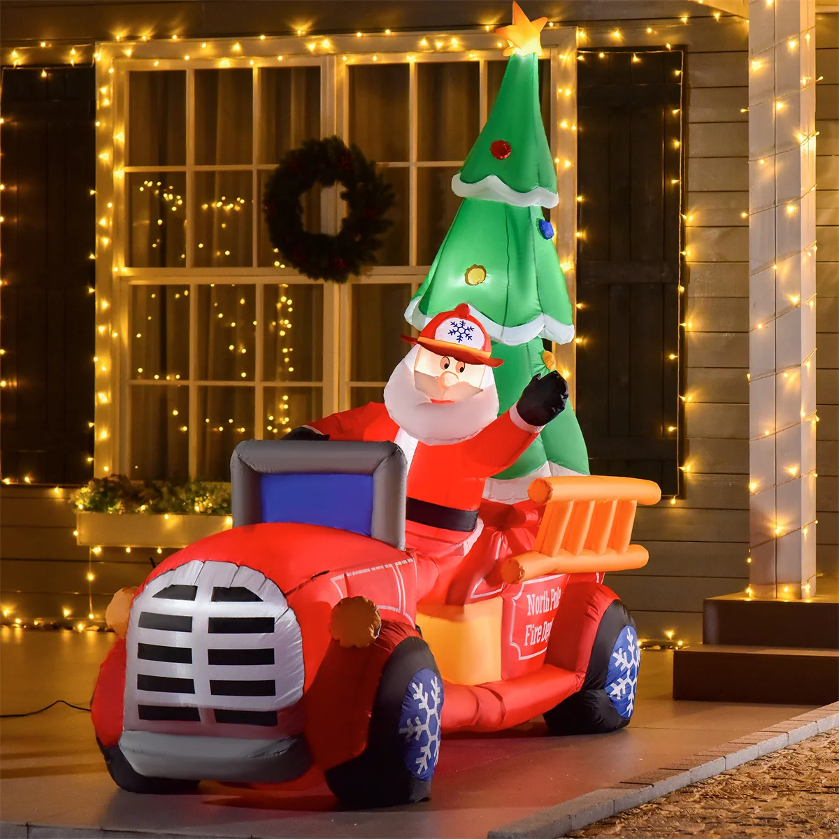 Firefighter Santa Claus with Christmas Tree - Image 1